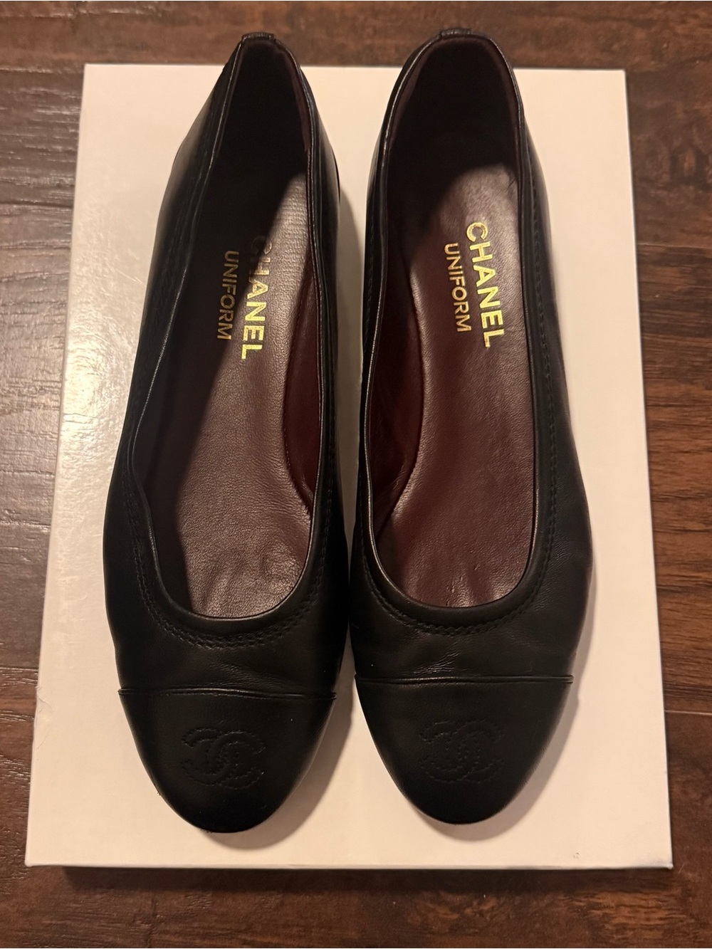 CHANEL Black Leather Ballet Flats with Embossed CC Toe - uniform